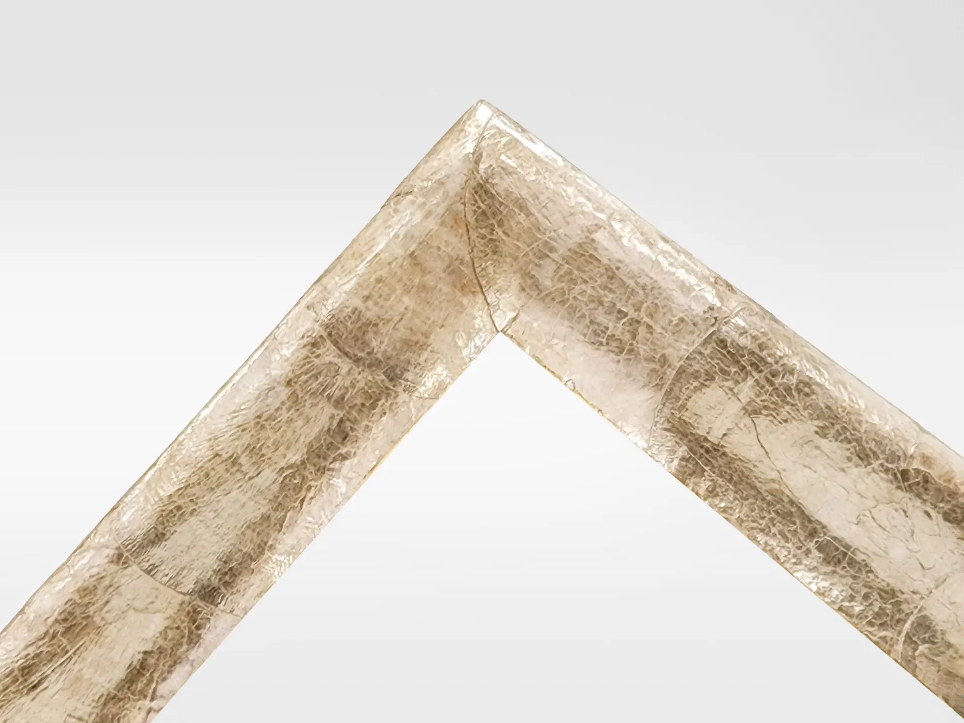 Corner detail of champagne coloured Capiz oyster shell closed corner frame by Dawsons Handcrafted