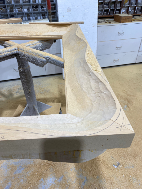 wave mirror being carved out by hand in the dawsons handcrafted workshop